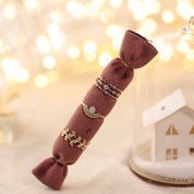 Bague dorée zircon Bena - Bijou photographié sur un présentoir 