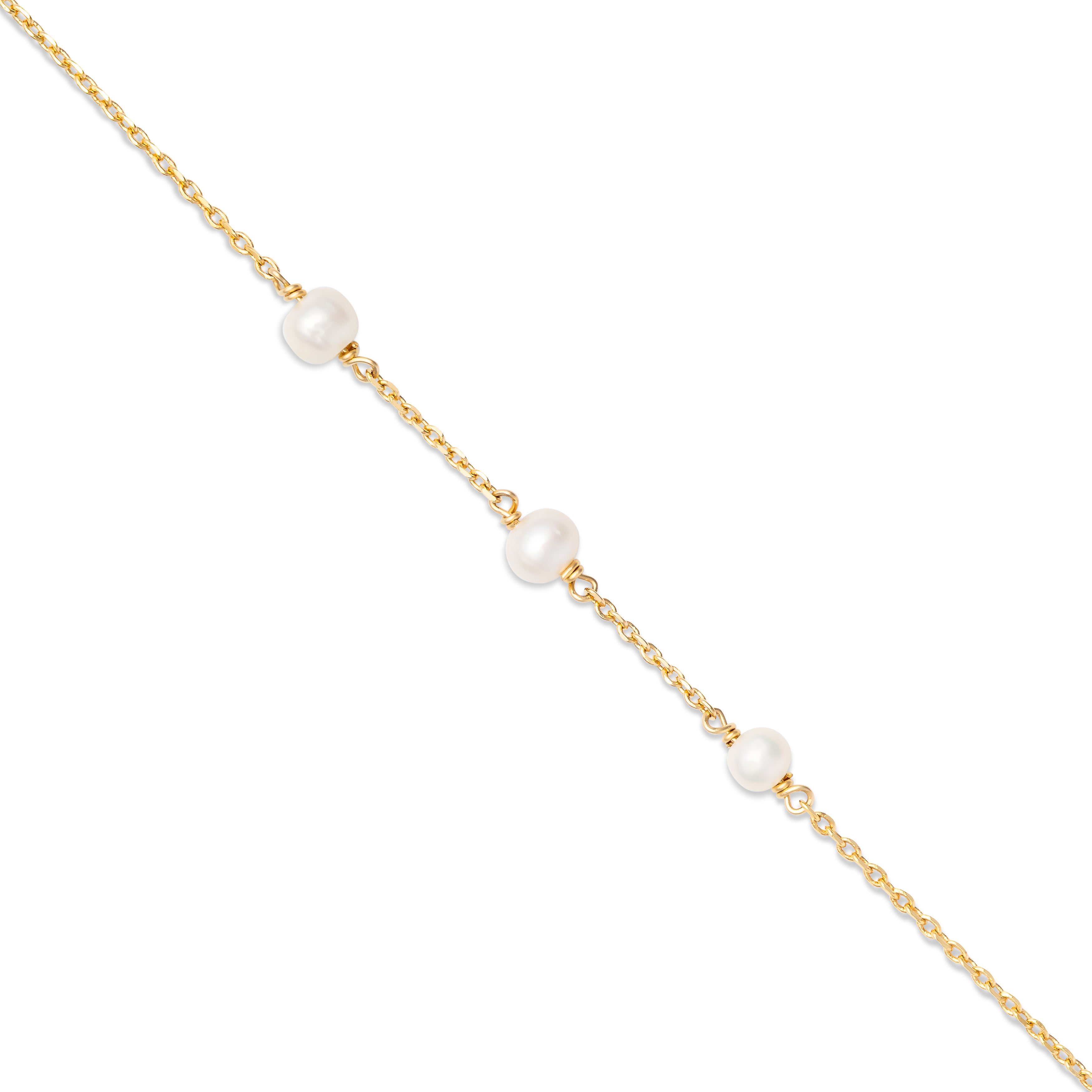 Bracelet doré Ariya orné de trois perles en nacre - Bijou photographié sur fond blanc