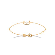 Bracelet doré Audrey orné d'une perle de nacre - Bijou photographié sur fond blanc 