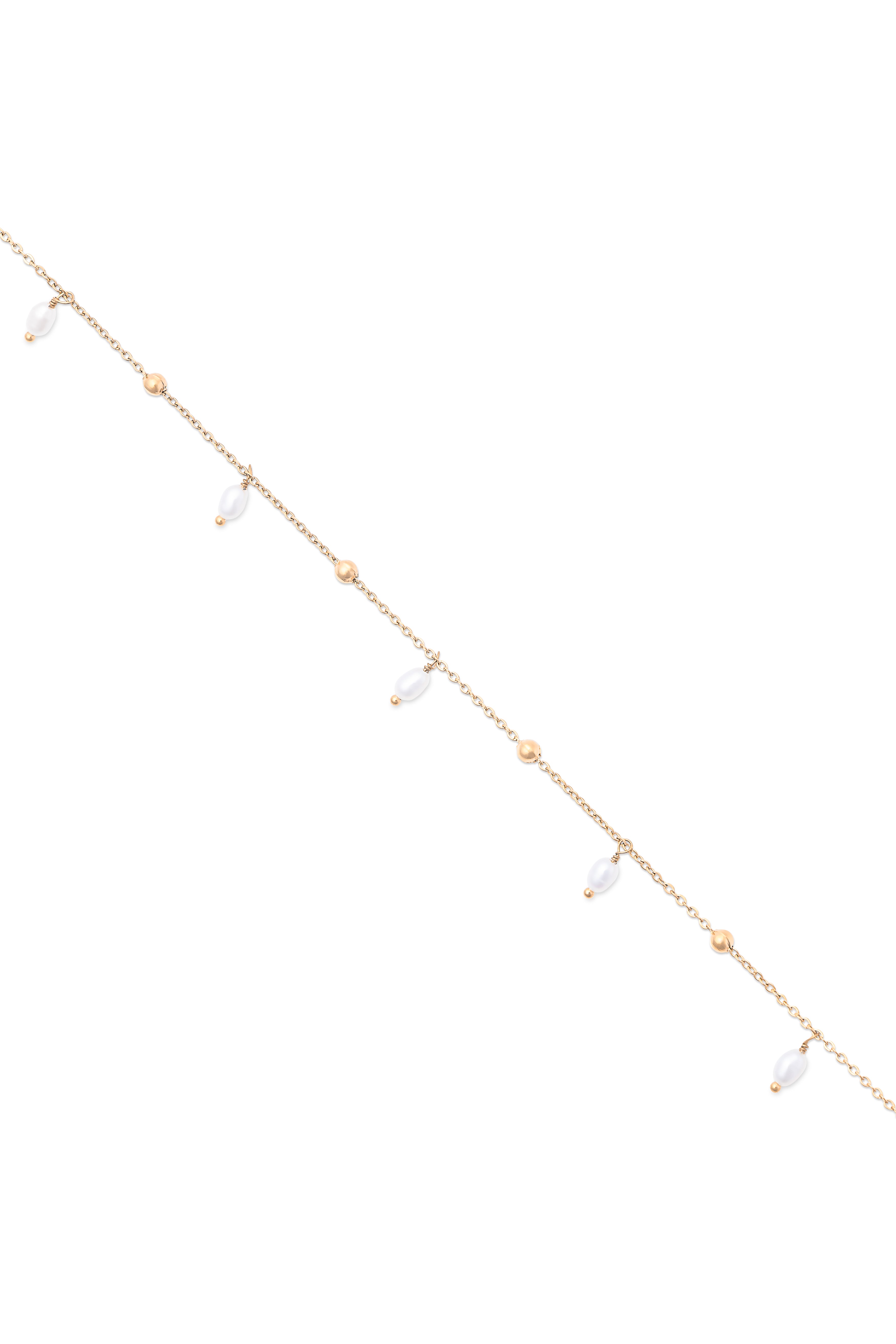 Bracelet doré Tae chaîne perlée ornée de pampilles en nacre - Bijou photographié sur fond blanc