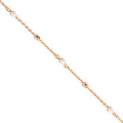 Bracelet doré chaîne perlée et nacre - Bijou photographié sur fond blanc 