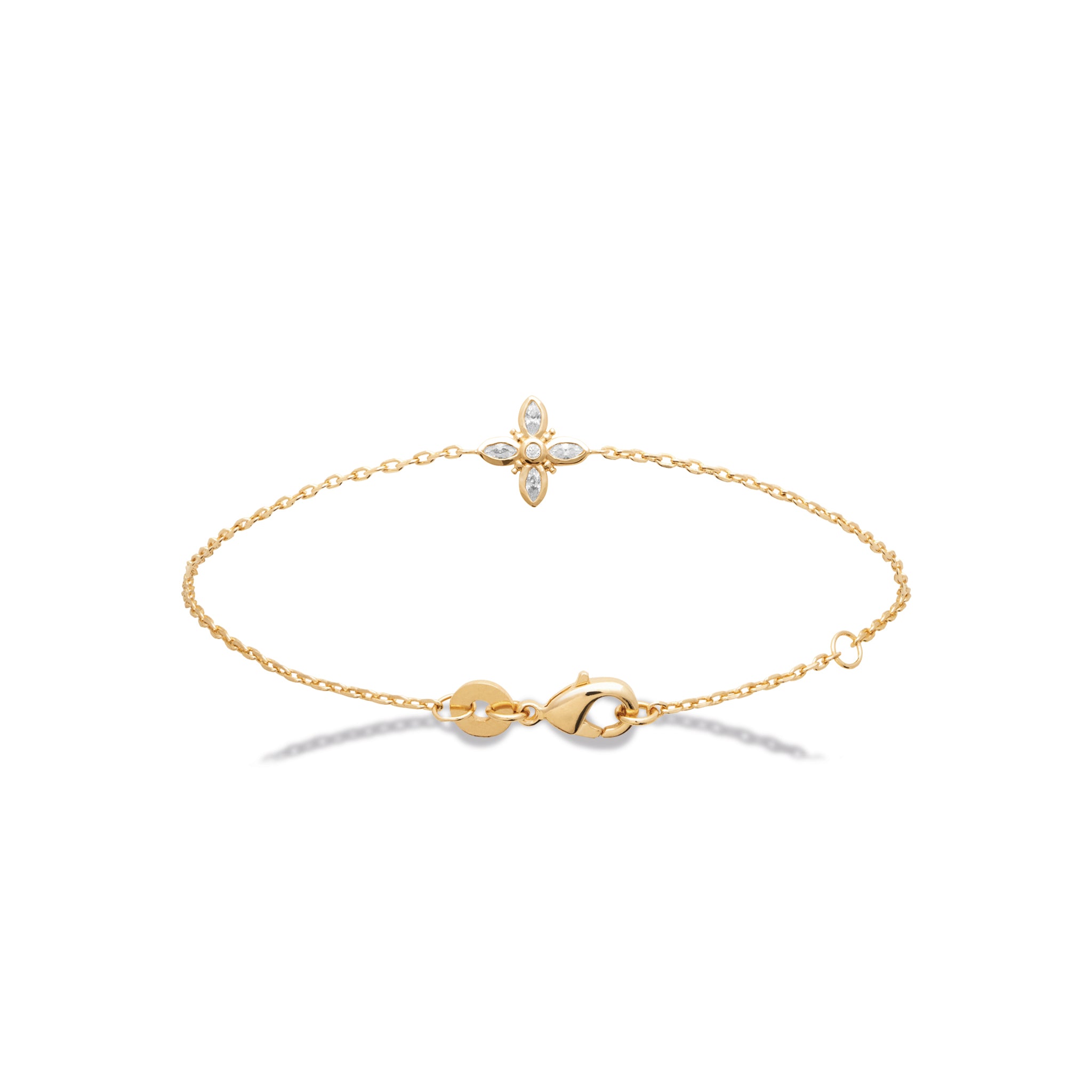 Bracelet doré trèfle orné de zircons - Bijou photographié sur fond blanc 
