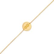 Bracelet Mantra infini laiton doré 3 microns imaginé et créé par Chloé Rose - Bijou photographié sur fond blanc