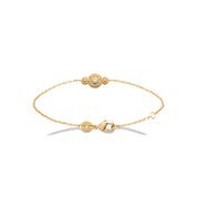 Bracelet doré orné d'un zircon - Bijou photographié sur fond blanc 