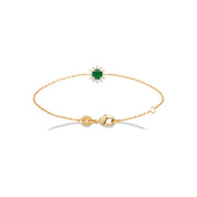 Bracelet doré Benedicte, zircon vert central entouré de zircons blancs - Bijou photographié sur fond blanc 