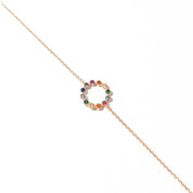 Bracelet doré Elea avec un cercle orné de zircons multicolores - Bijou photographié sur fond blanc