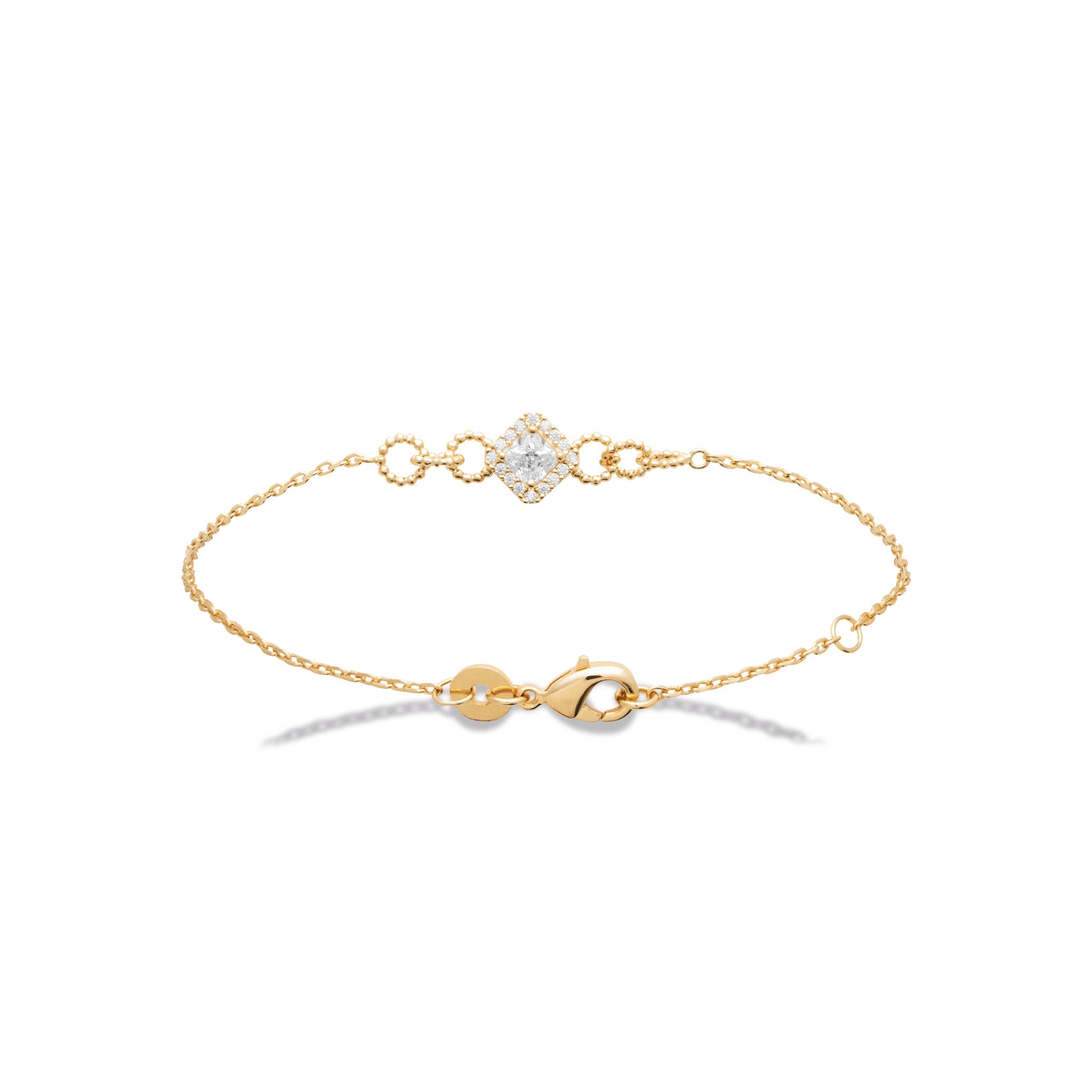 Bracelet doré Marine, zircon central entouré de zircons et petits cercles ornés de petites perles dorées - Bijou photographié sur fond blanc 