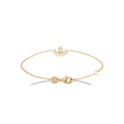 Bracelet doré zircon avec ornement - Bijou photographié sur fond blanc