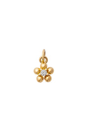 Charm doré zircon Mini fleur blanc - Bijou sur fond blanc