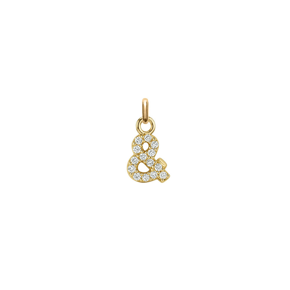 Charm doré zircons lettre and - Bijou photographié sur fond blanc