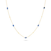 Collier sautoir doré Amilda sodalite chaîne fine orné de pierres naturelles - Bijou photographié sur fond blanc