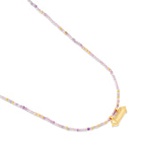 Collier doré améthyste SAGA - Bijou photographié sur fond blanc