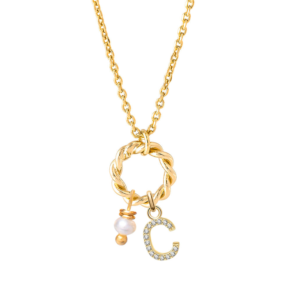 Collier personnalisable doré charms Alma - Bijou photographié sur fond blanc