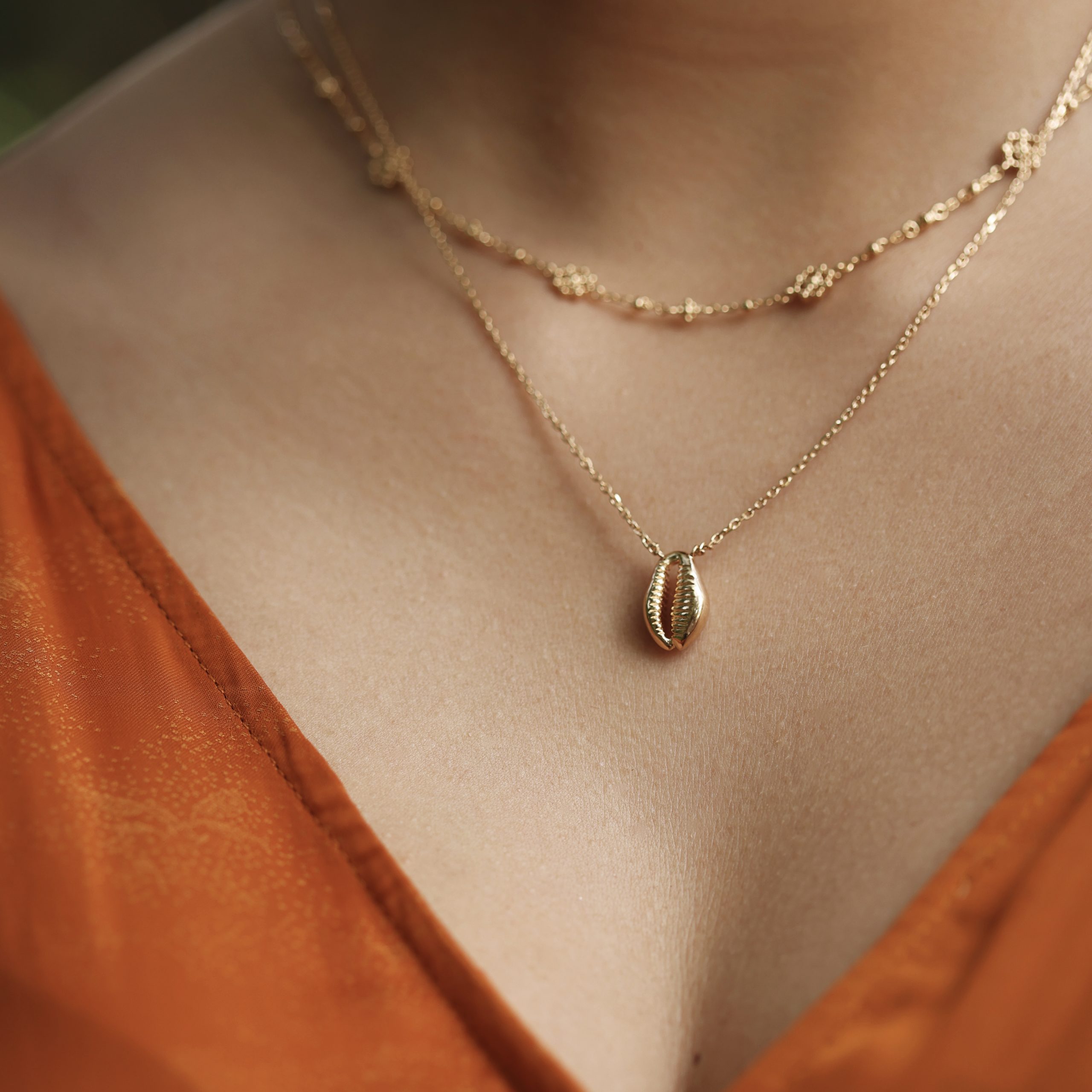 Collier doré Cauri - Bijou porté