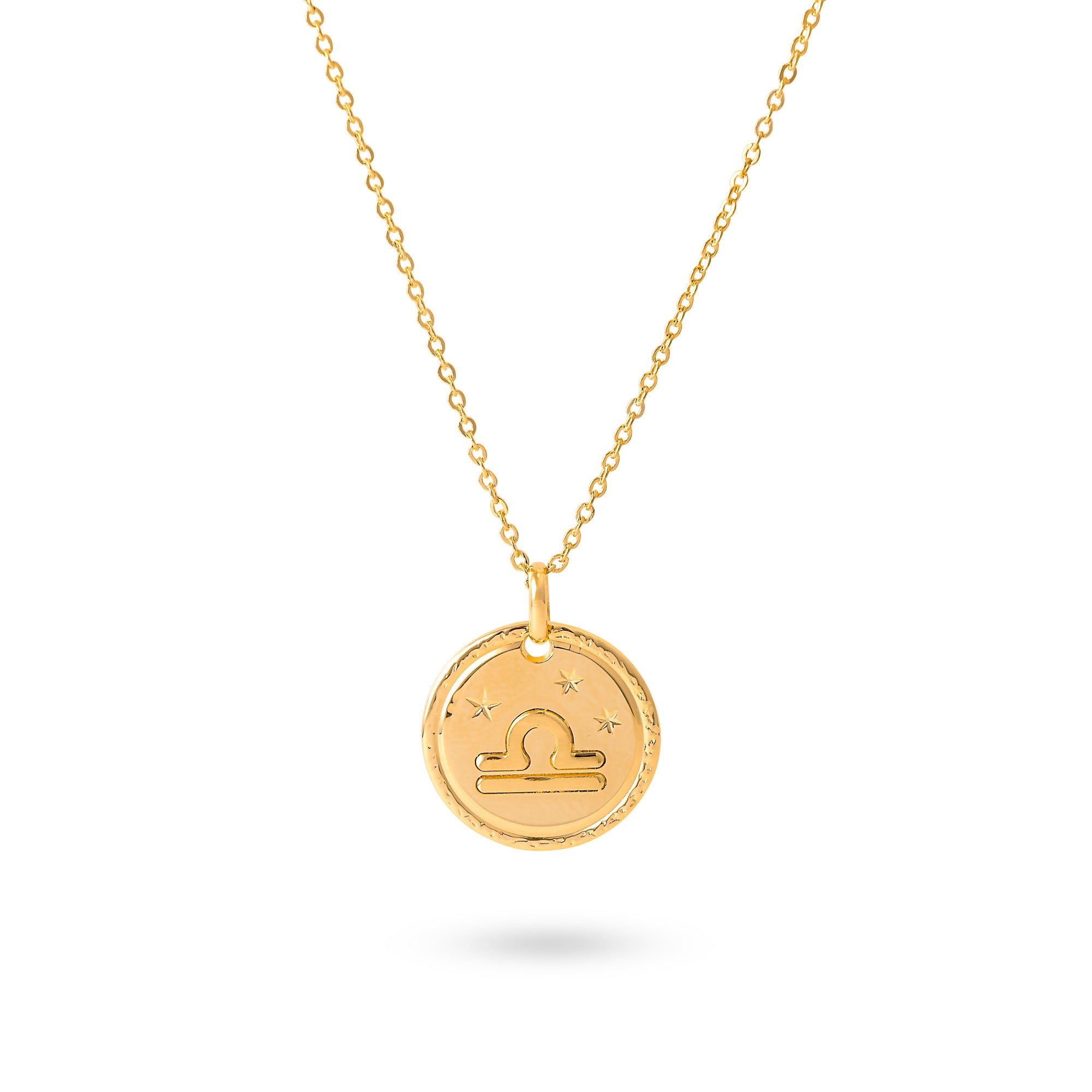 Collier doré signe astrologique Balance - Bijou photographié sur fond blanc