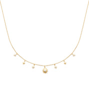 Collier doré et zircons Celeste pampilles étoiles soleil - Bijou photographié sur fond blanc 