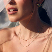 Collier double doré SUSANA en acier inoxydable - Collection Cérémonie - Bijou porté