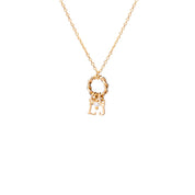 Collier personnalisable doré charms Alma - Bijou photographié sur fond blanc