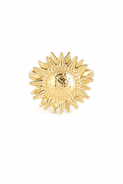 Bague anti-stress dorée Michaela ajustable ornée d'un soleil tournant - Bijou sur fond blanc