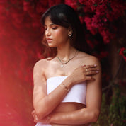 Boucles d'oreilles dorees Najoua - Bijou porté