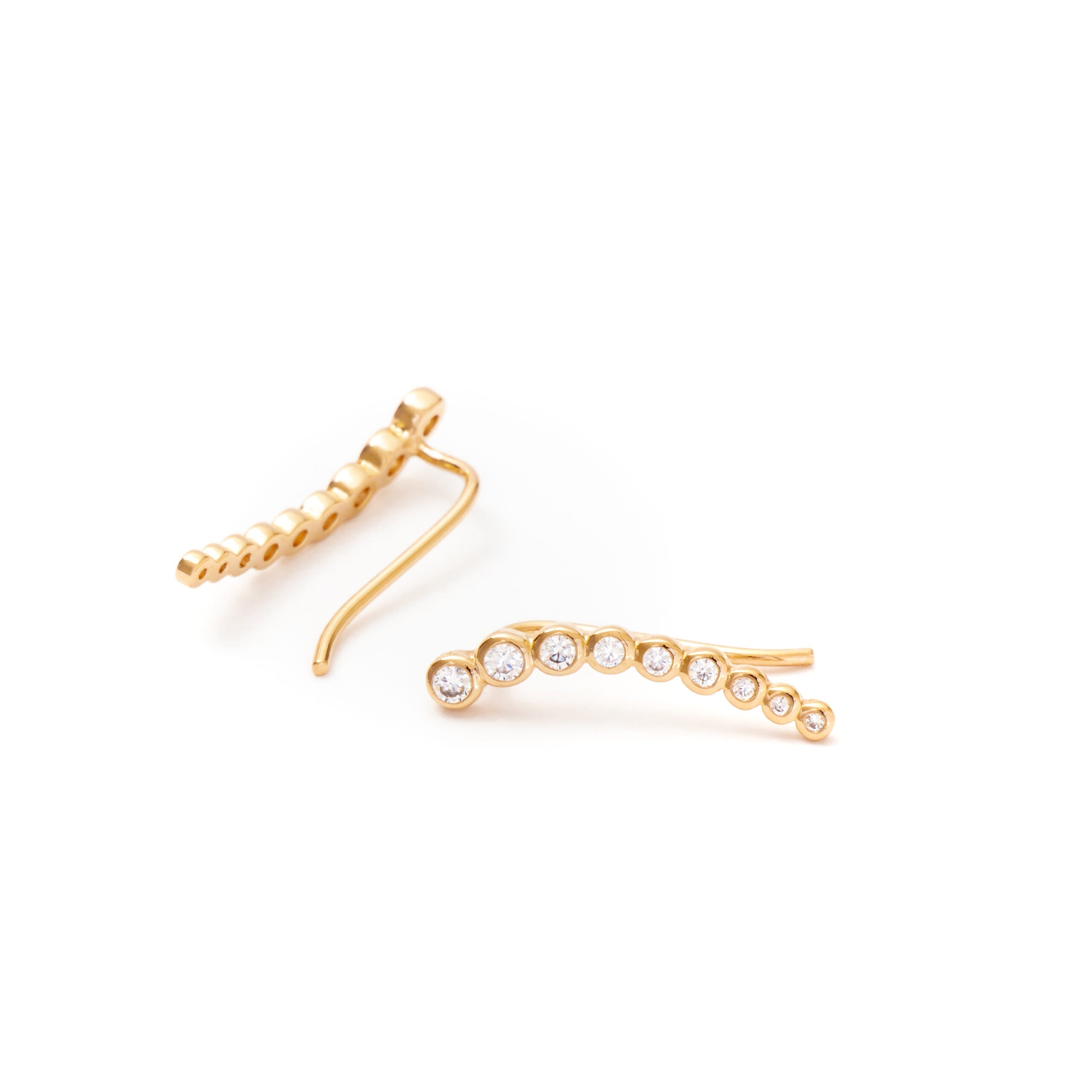 Boucles dorées barrettes serties de zircons Gloria - Bijou sur fond blanc
