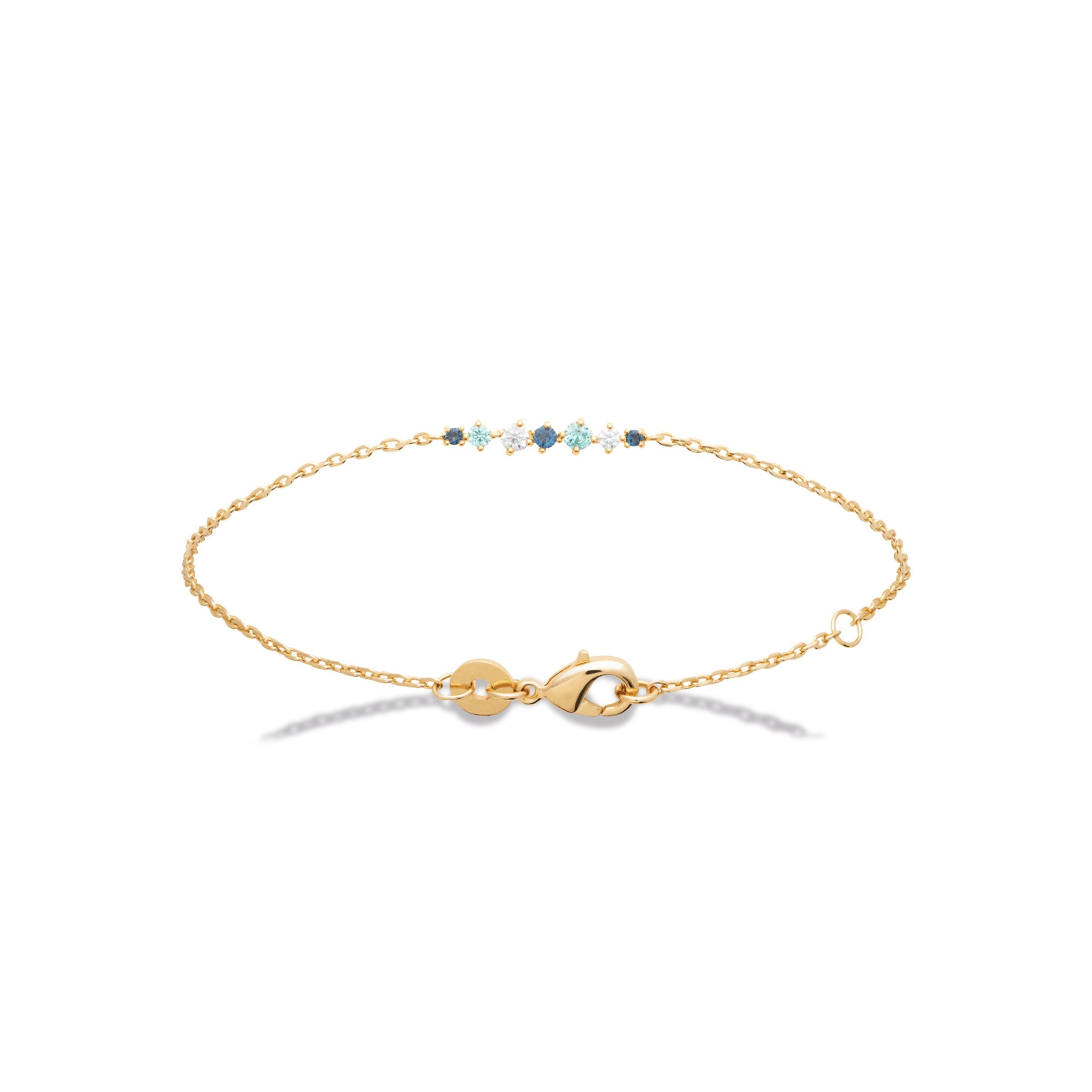 Bracelet doré Azur zircons bleu, blanc et turquoise - Bijou photographié sur fond blanc