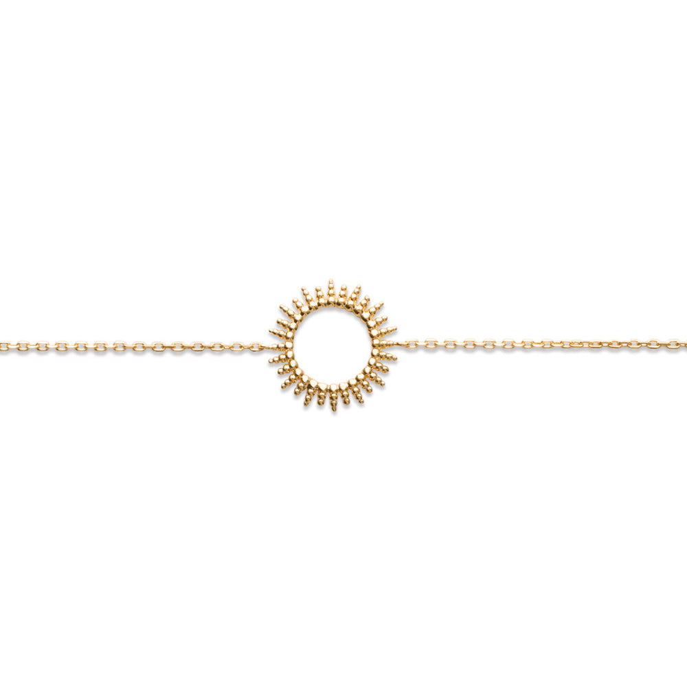 Bracelet doré Adi motif soleil ajouré - Bijou sur fond blanc