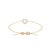 Bracelet doré Amata cœur ajouré orné de zircons - Bijou sur fond blanc