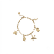 Bracelet maille doré Ewan pendentifs soleil, lune, étoile de mer et coquillages - Bijou sur fond blanc