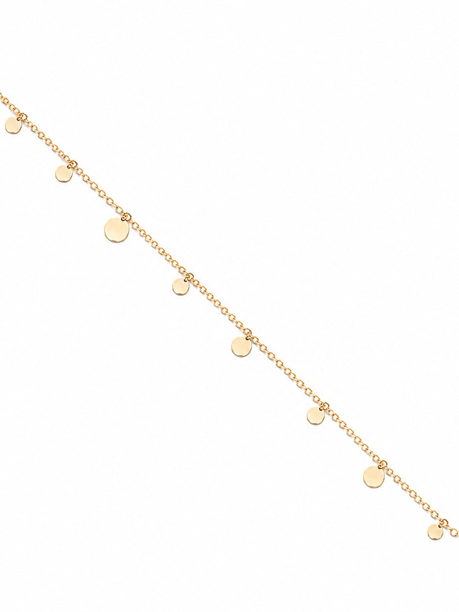 Bracelet doré Thalia rond chaîne fine orné de petites pastilles rondes - Bijou sur fond blanc