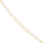 Bracelet doré Tiana double chaîne perlée - Bijou sur fond blanc
