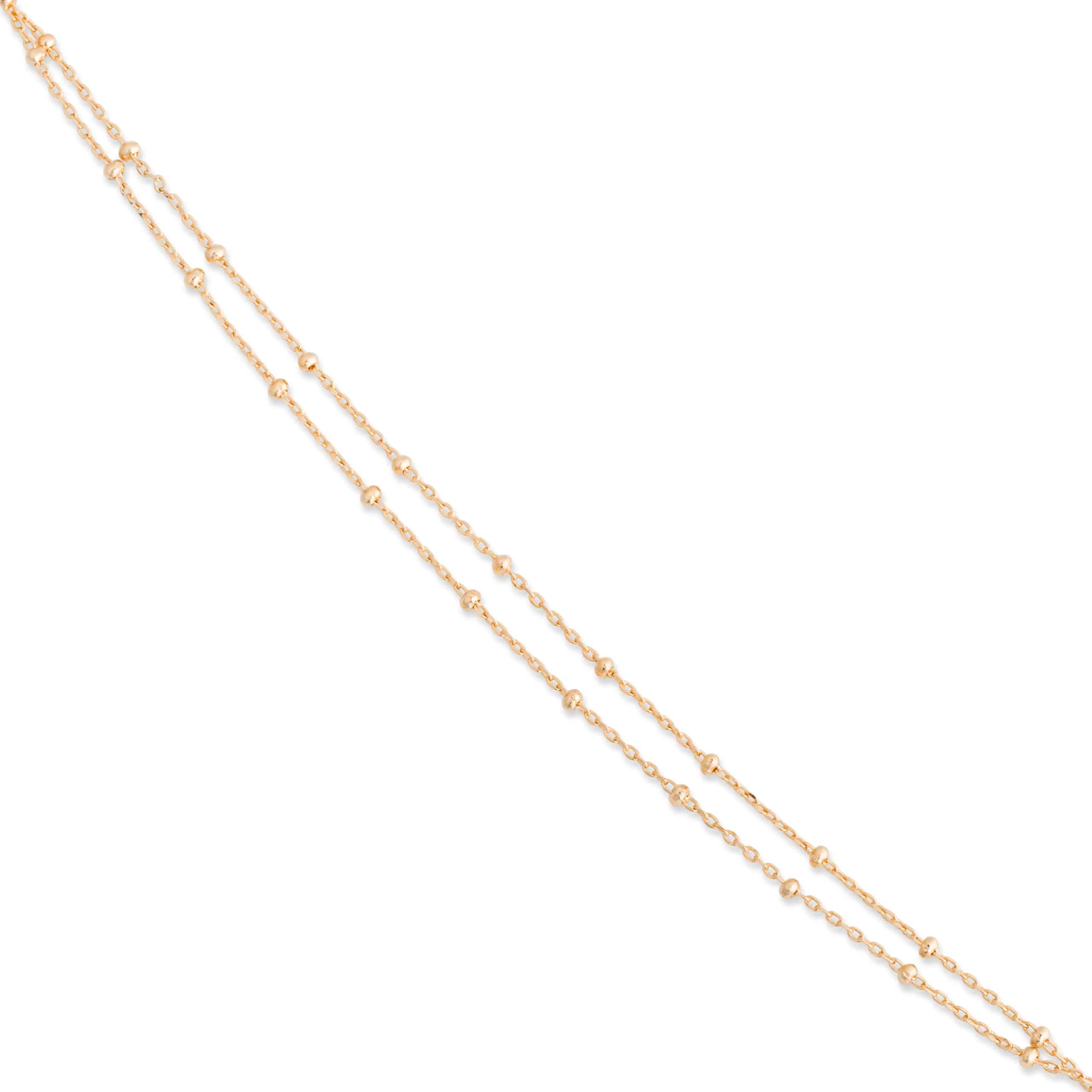 Bracelet doré Tiana double chaîne perlée - Bijou sur fond blanc