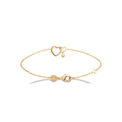 Bracelet doré Anaïs cœurs entrelacés avec pendentif zircon - Bijou photographié sur fond blanc
