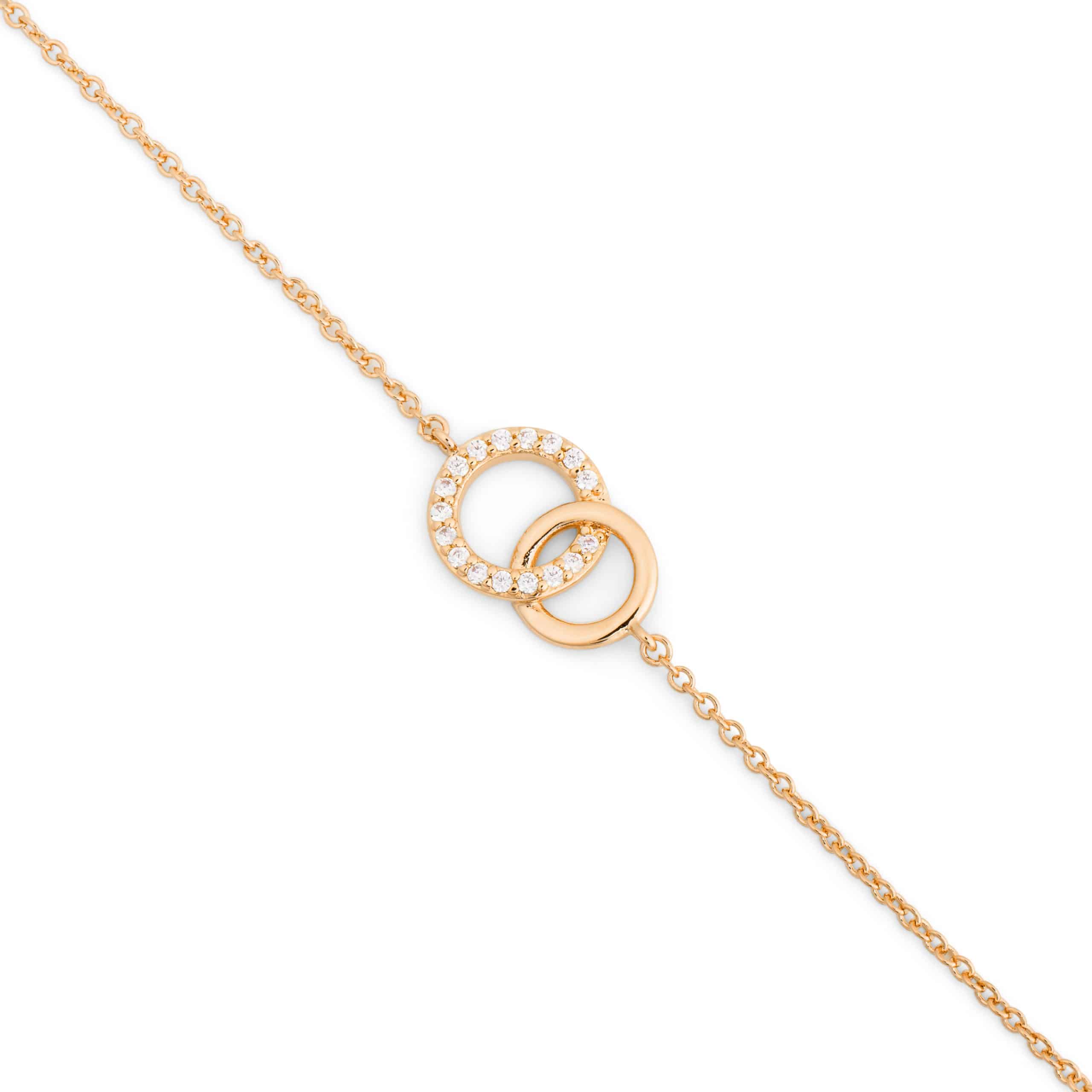 Bracelet doré Danaé anneaux entrelacés avec zircons - Bijou sur fond blanc