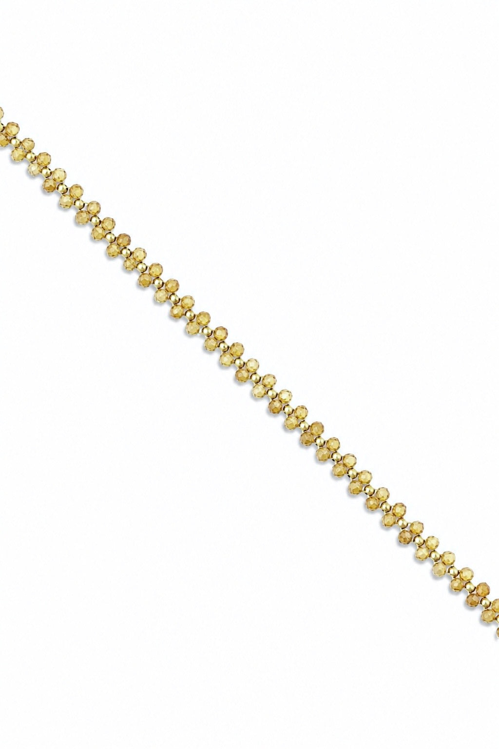 Bracelet Jahnis citrine en pierres naturelles et perles dorées avec finition perles en nacre sur la chaîne de rallonge - Bijou sur fond blanc