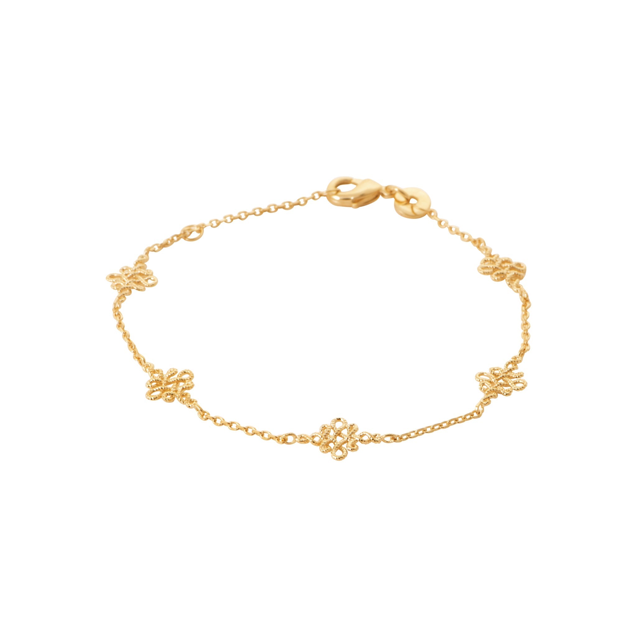 Bracelet doré Janice en plaqué or avec motifs infini entrelacés - Bijou photographié sur fond blanc, Chloé Rose Genève