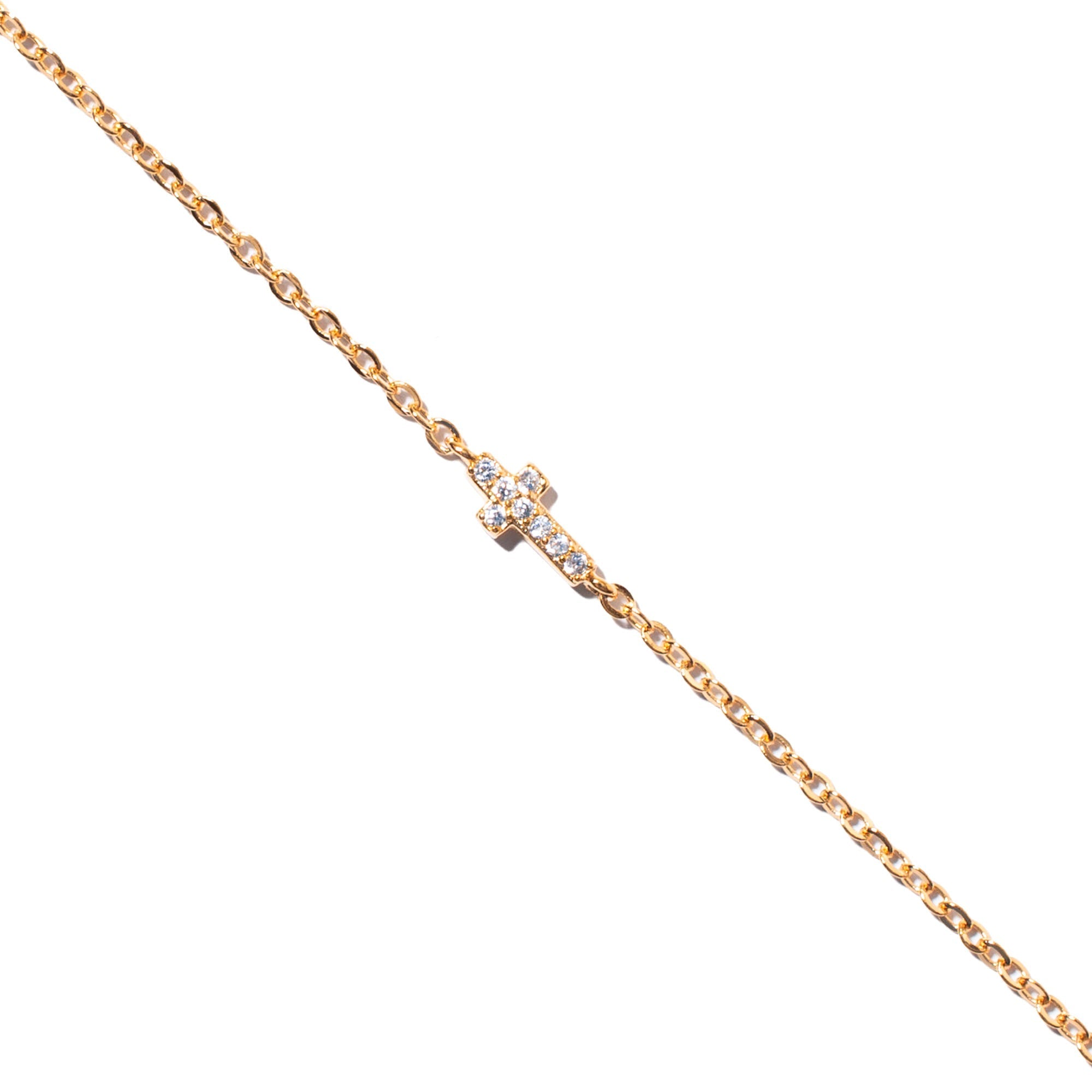  Bracelet doré mini croix zircons Xael - Bijou photographié sur fond blanc