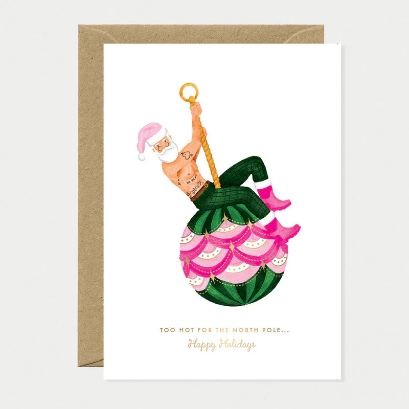 Carte de Noël en papier naturel blanc avec un homme déguisé en père Noël qui se balance sur une boule de Noël - Papeterie