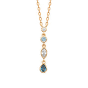 Collier doré Iranya orné d'un pendentif serti de zircons blancs et bleus - Bijou sur fond blanc
