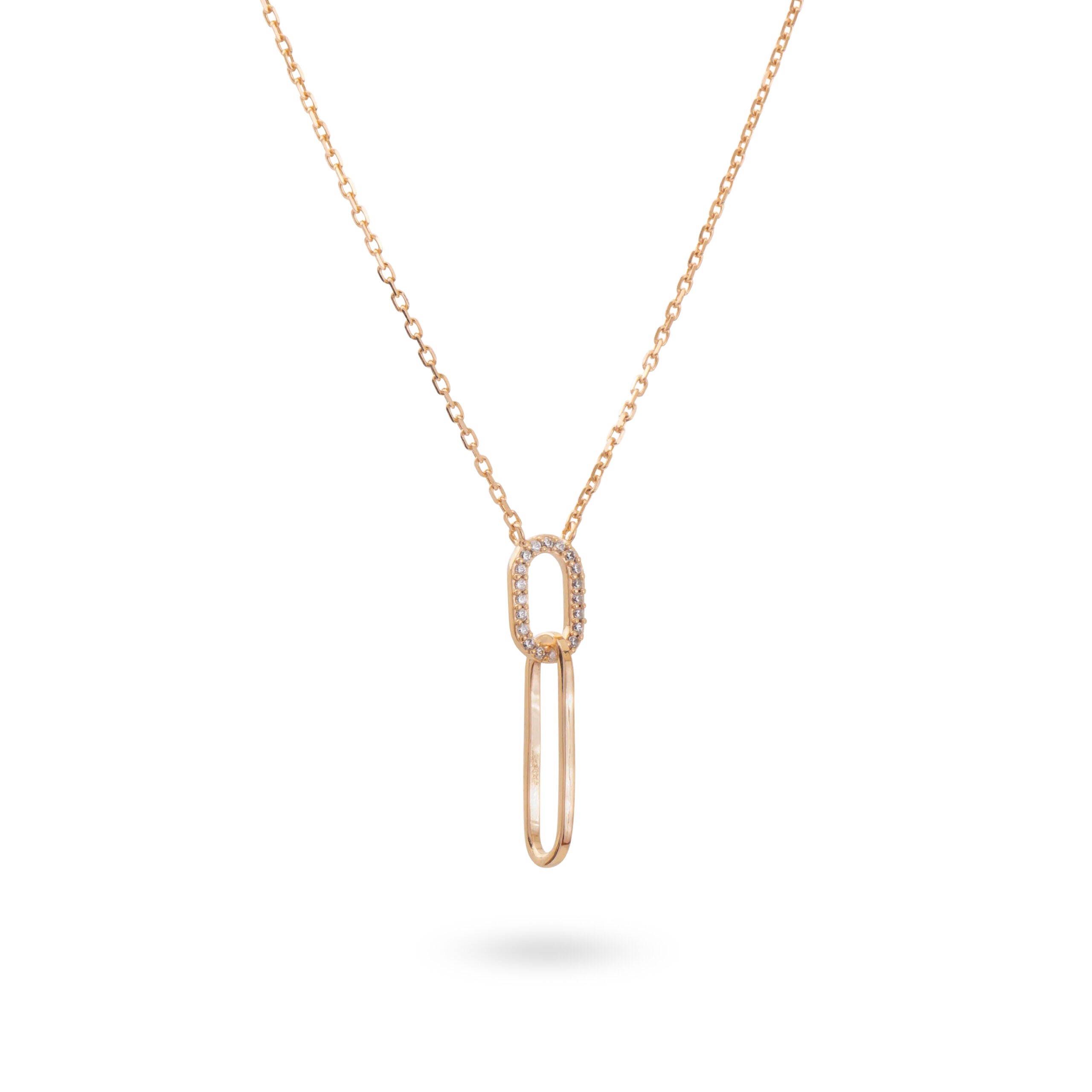 Collier doré Nadja pendentif trombone serti de zircons - Bijou sur fond blanc