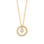  Collier doré Naika avec anneau perlé et pendentif zircon - Bijou photographié sur fond blanc