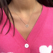 Collier doré Romy pendentif double cœur avec zircons - Bijou porté