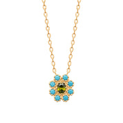 Collier doré Ariana orné d'un pendentif fleur serti de zircons turquoises et verts - Bijou sur fond blanc