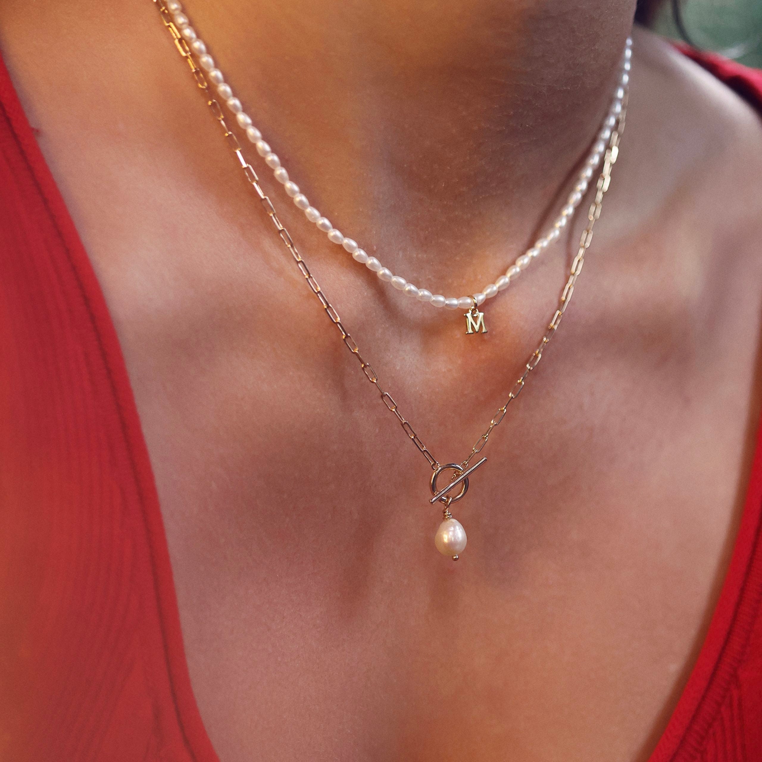 Collier maille doré Avaha avec anneau et pendentif nacre - Bijou porté