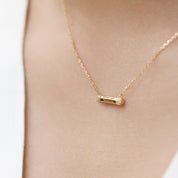 Collier doré talisman Basma - Bijou porté