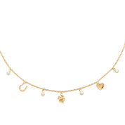 Collier doré pampilles cœur, fer à cheval, trèfle et zircons Bella - Bijou photographié sur fond blanc
