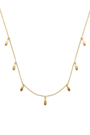 Collier doré Clément orné de pampilles gouttes - Bijou sur fond blanc
