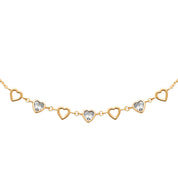 Collier doré Isidora avec cœurs ajourés et cœurs sertis de zircons - Bijou photographié sur fond blanc