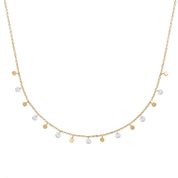 Collier doré Mimi pampilles pastilles rondes et zircons - Bijou photographié sur fond blanc
