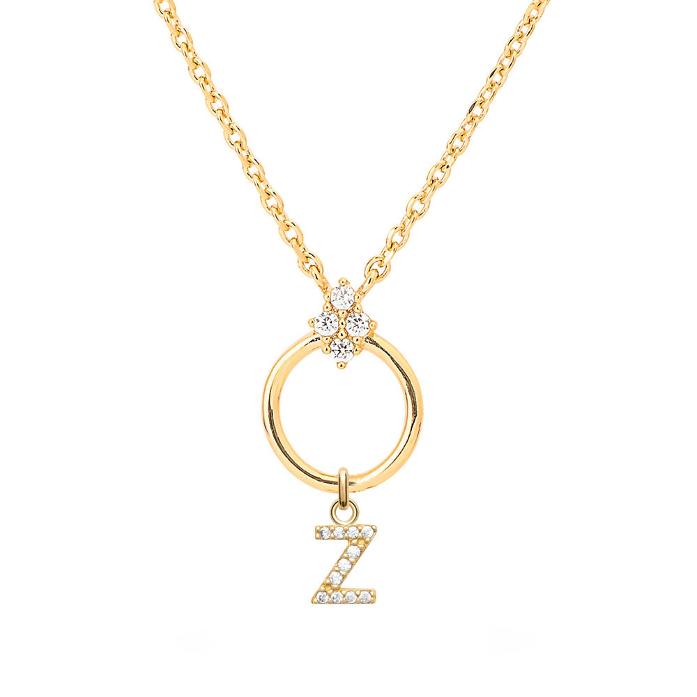 Collier personnalisable doré initiales et charms JANNY - Bijou photographié sur fond blanc